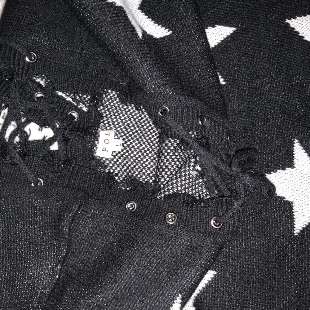 POL Star Pattern Black and White Sweater with criss cross Laced neck design